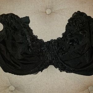 gently preowned telimussto bra. no blemishes or tears. Sz